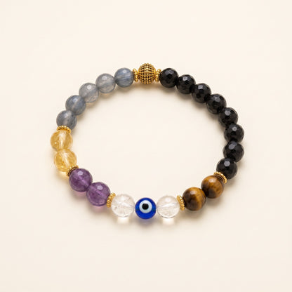 Shri Divya Ratan Nazar protection bracelet featuring 8mm multi-crystal beads and a central evil eye charm.